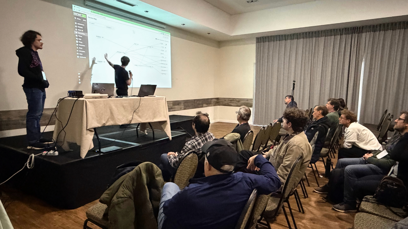 Alex and Ivan demoing Coroot's open source features